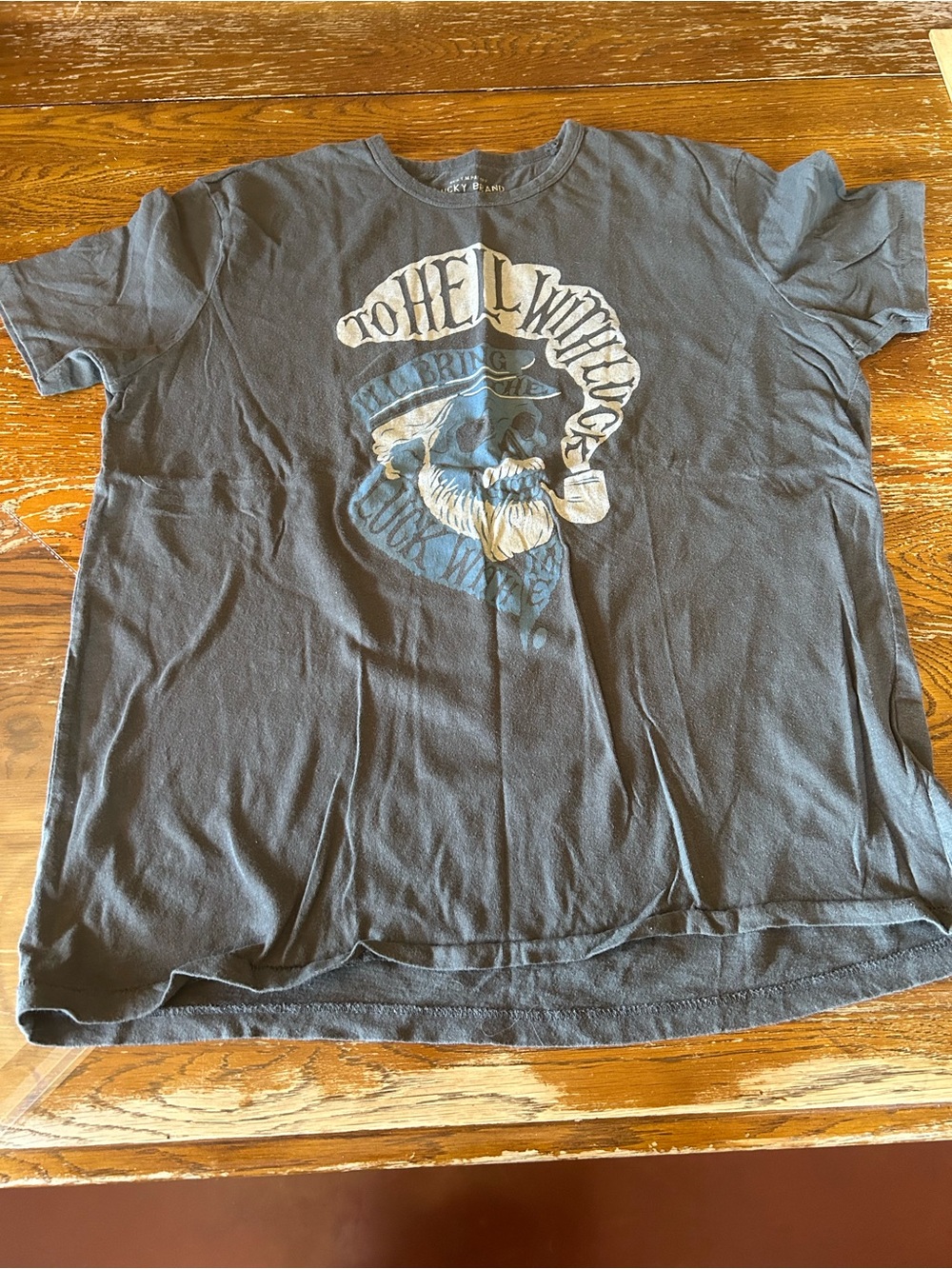 Graphic Skull Pipe T-Shirt in Faded Black